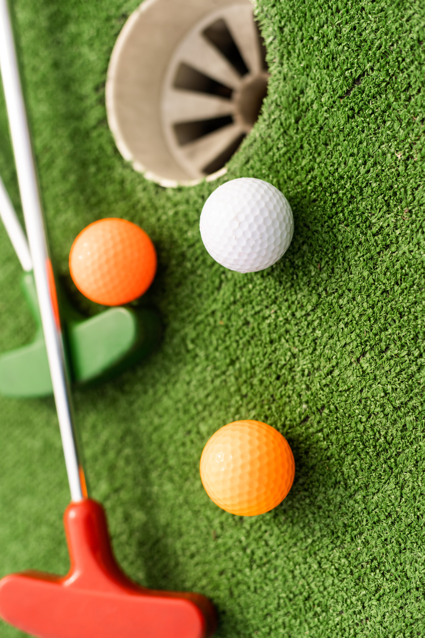 putter and golf balls